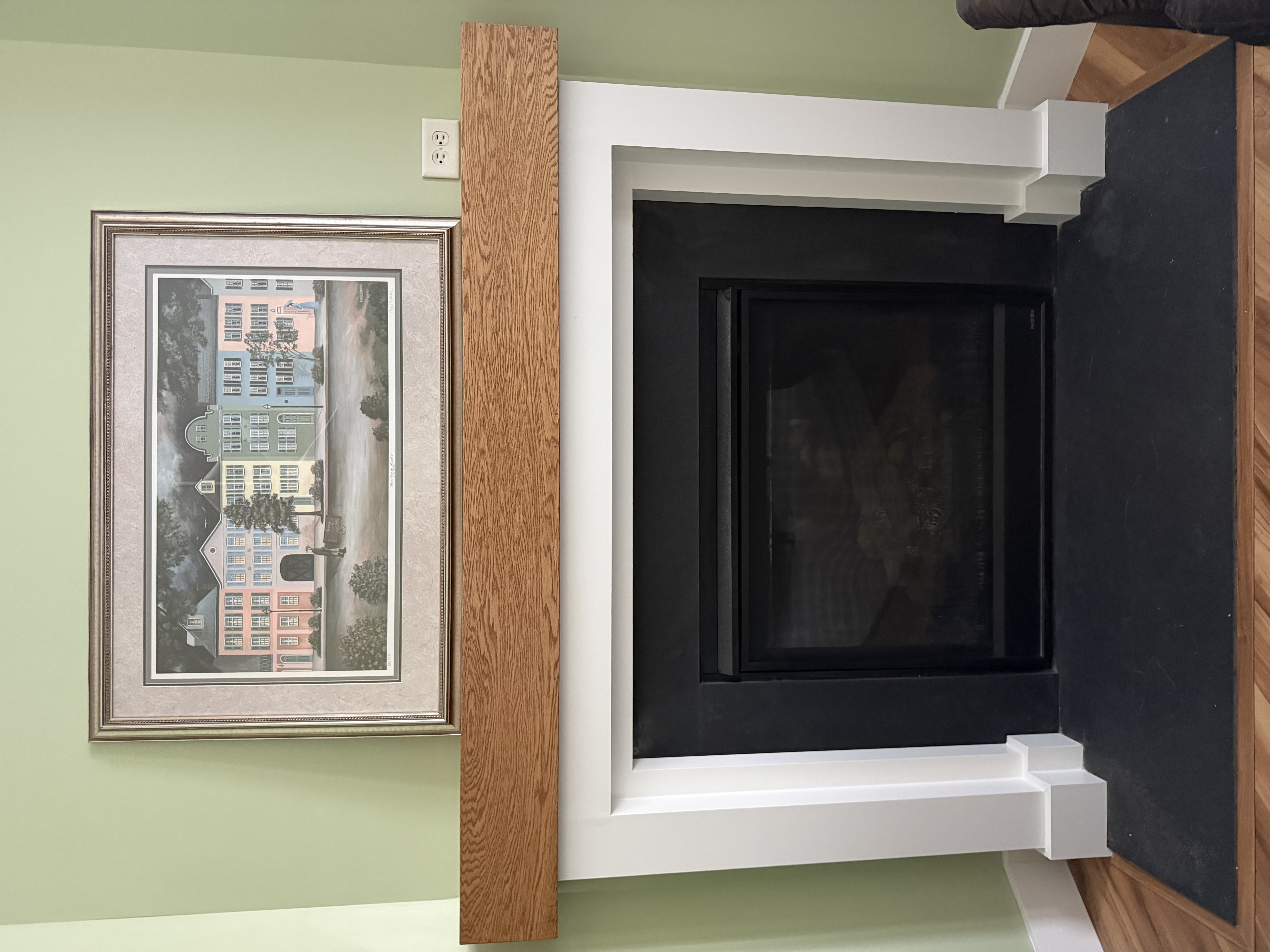 Custom oak fireplace mantel built by C&A Custom Builders